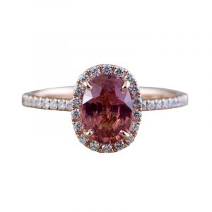 Oval peach sapphire and diamond ring