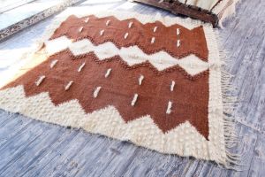 Large brown accent rug