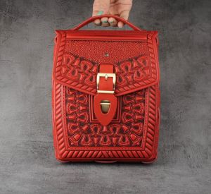 Red hand tooled crossbody briefcase