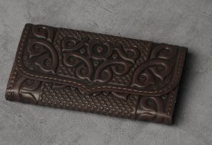 Brown hand tooled leather wallet