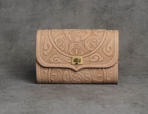 Beige hand tooled leather purse