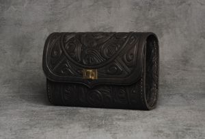 Brown hand tooled leather purse