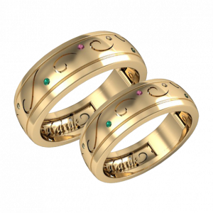 A pair of Emerald and Sapphire wedding bands