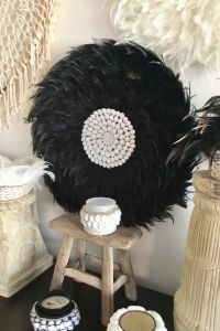 Black feather and shells wall decor