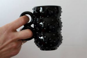 Black spiky ceramic mug