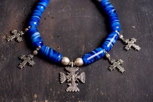 Ethnic blue glass beaded necklace with cross