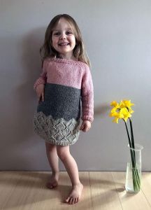 Warm knitted tunic for girl