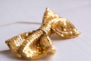 Gold bow tie