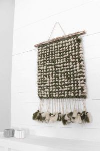 Green wall tapestry hanging with tassels