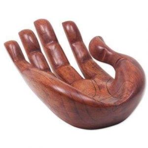 Human hand carved wood sculpture
