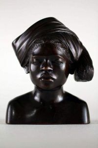 Indonesian woman carved wood sculpture
