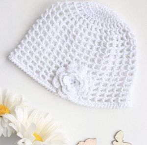 Knitted baby hats "White flower"