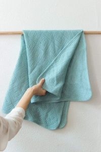 Light blue knitted baby blanket