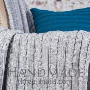 Light-gray cozy knit blanket