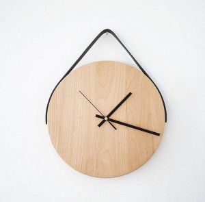 Round wall clock with leather strap