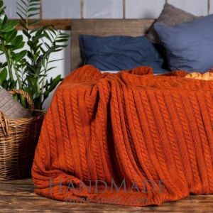 Terracotta knitted wool throw