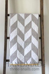 White and gray cotton patchwork quilt