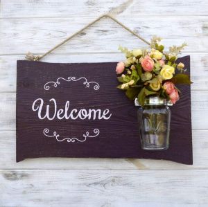Wooden welcome sign "Hospitality"