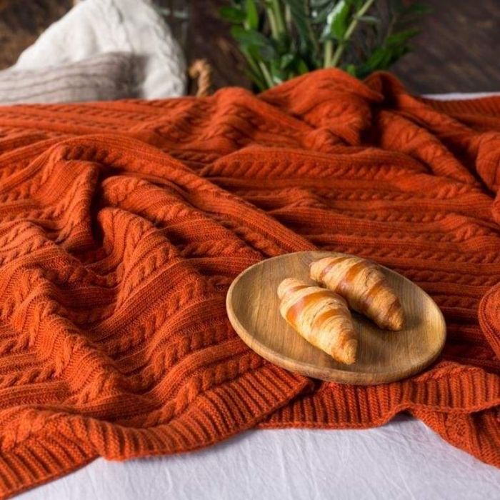 Terracotta knitted wool throw