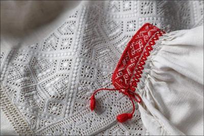 Amazing Ukrainian vyshyvanka white embroidery. Ancient thread colouring tradition