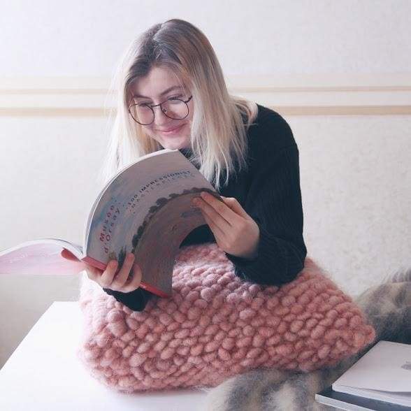 pink knitted pillow