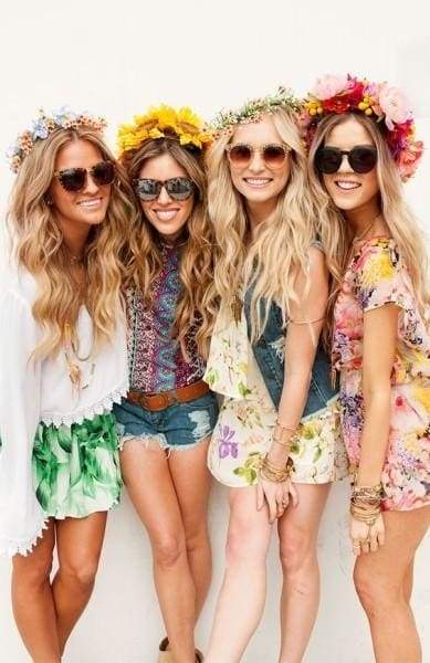 girls in flower wreaths